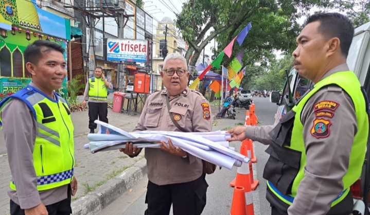 Jelang Idul Fitri 1444 H, Satlantas Polrestabes Medan Bagikan Spanduk