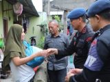 Satuan Brimob Polda Sumut Berbagi Sembako Jumat Berkah kepada Warga